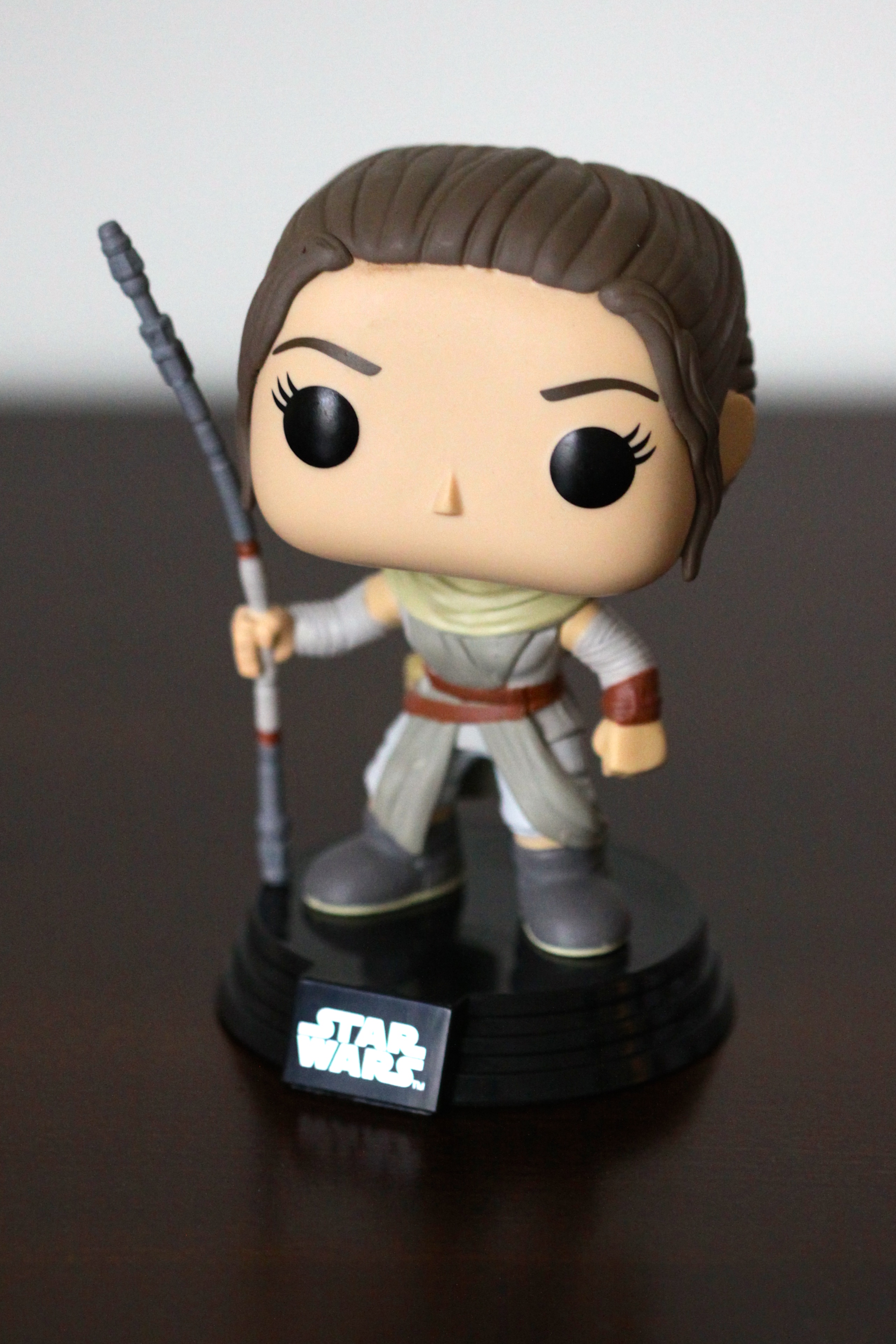 Bobblehead toy of Rey from Star Wars