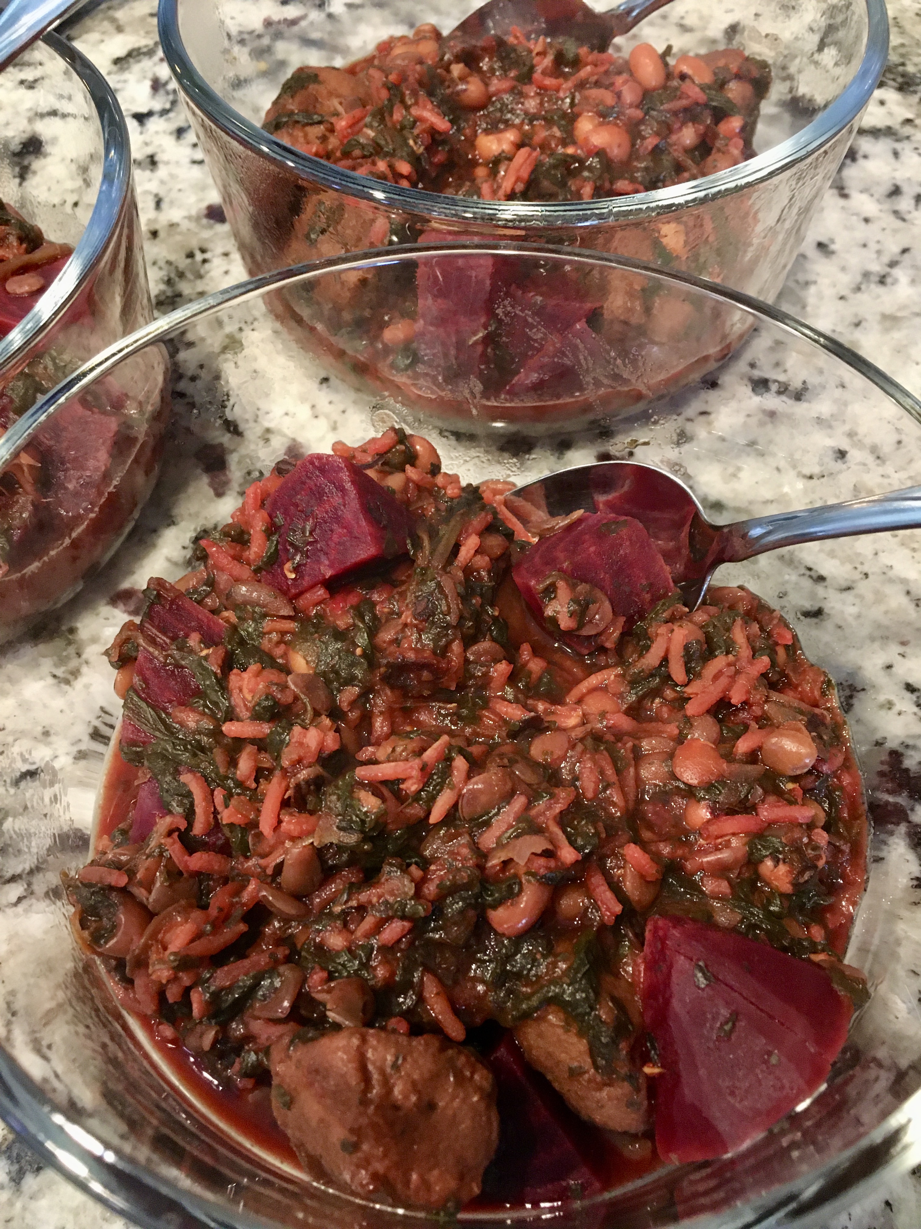 Beet soup in glass serving bowls