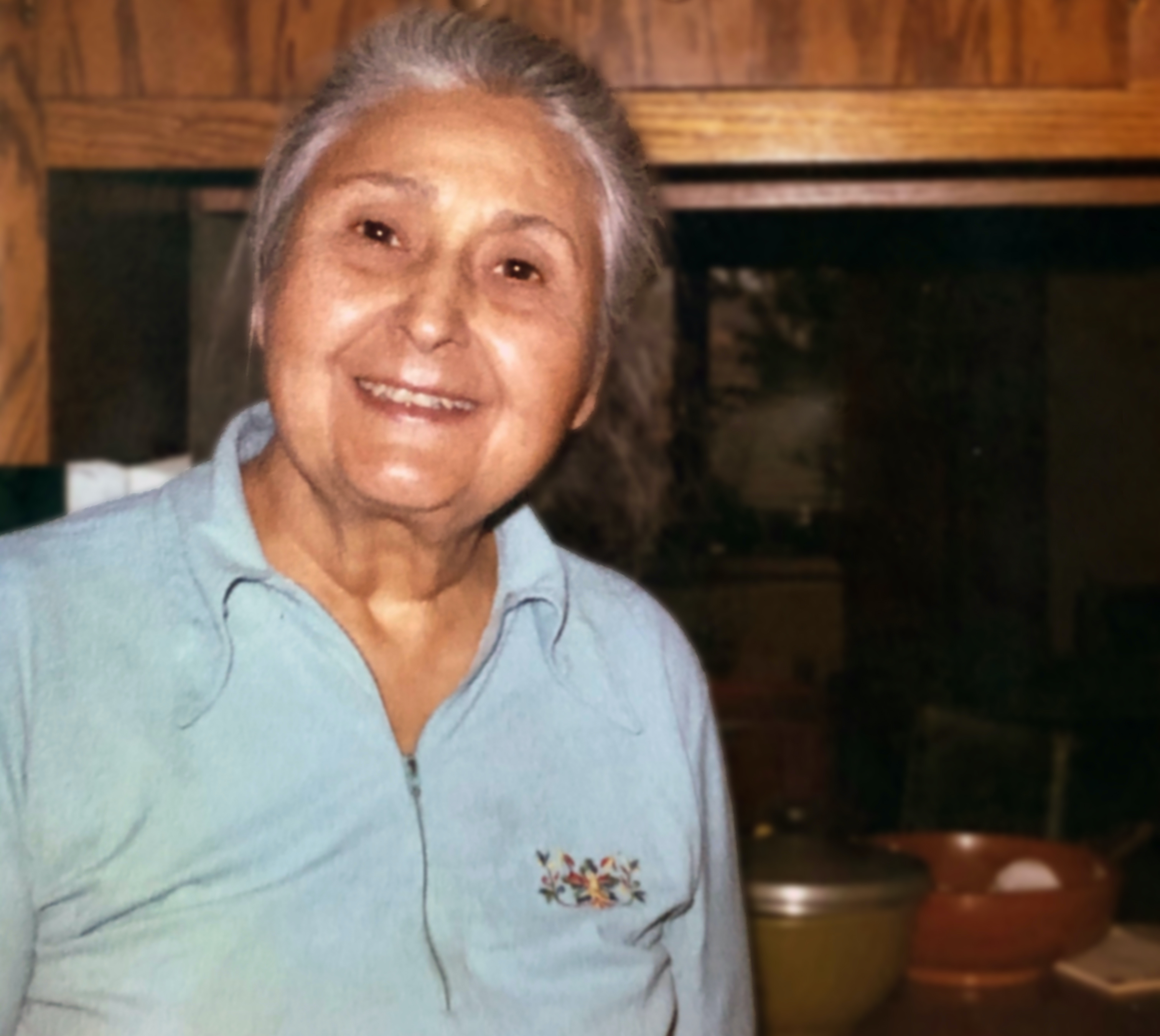 Katayoon stands in a kitchen