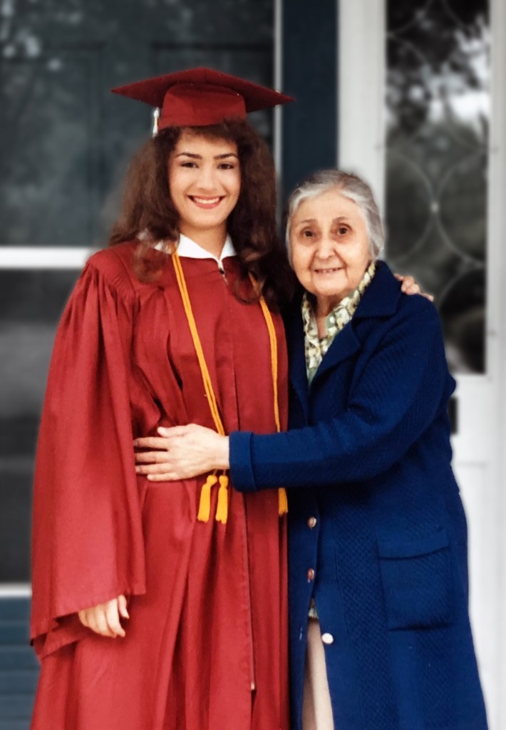 Nura and Katayoon embrace