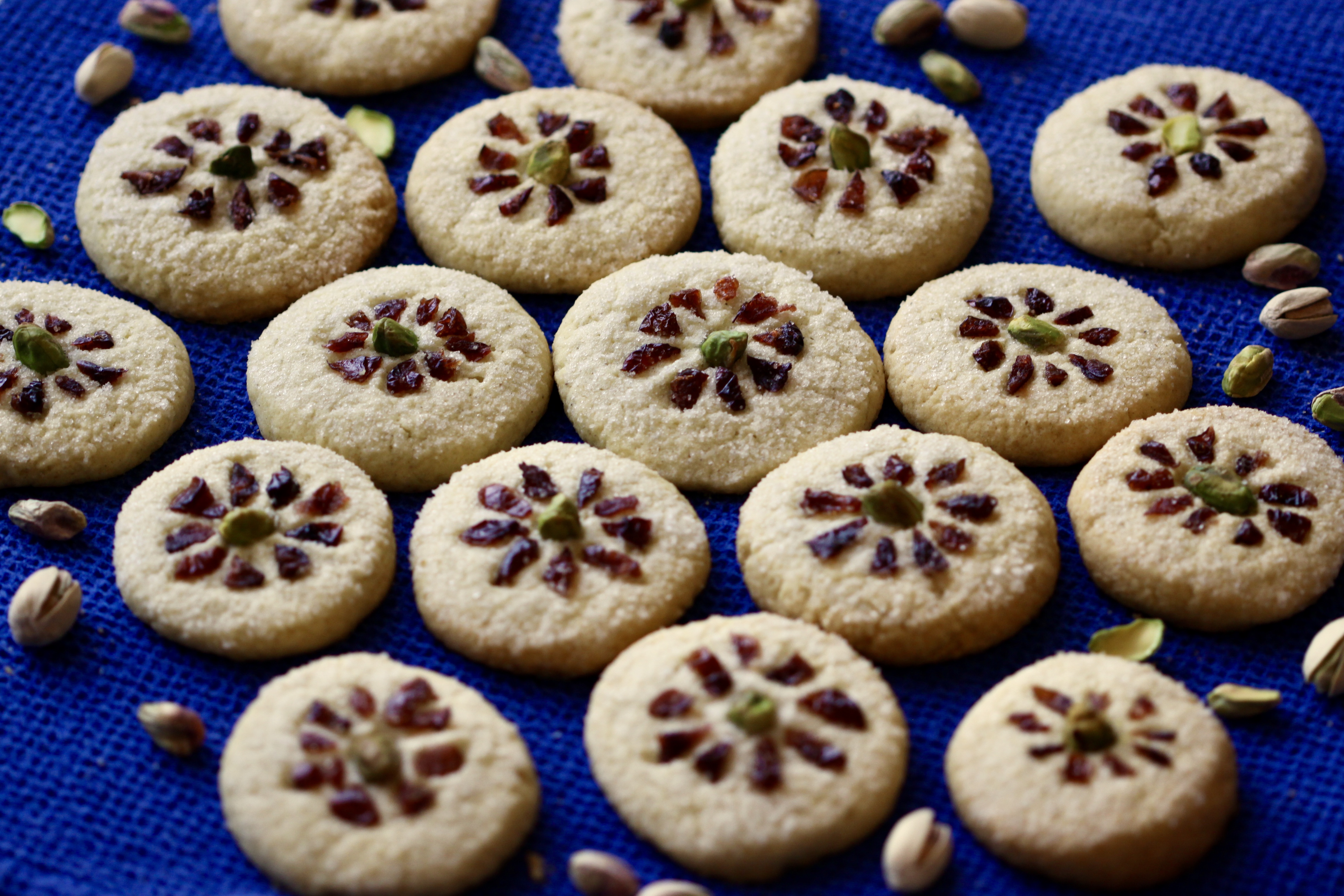 Rice cookies decorated with pistachios and dried cranberries