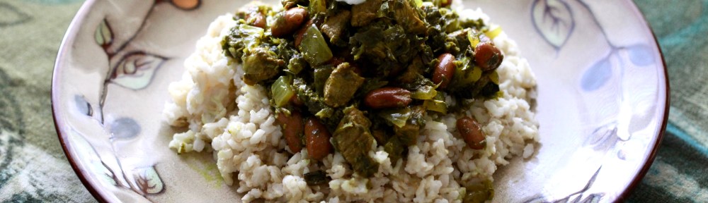 Gormay sabsi on a plate garnished with yogurt